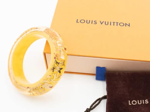 Bracelet Jonc Louis Vuitton Monogram Inclusion authentique d'occasion en résine jaune